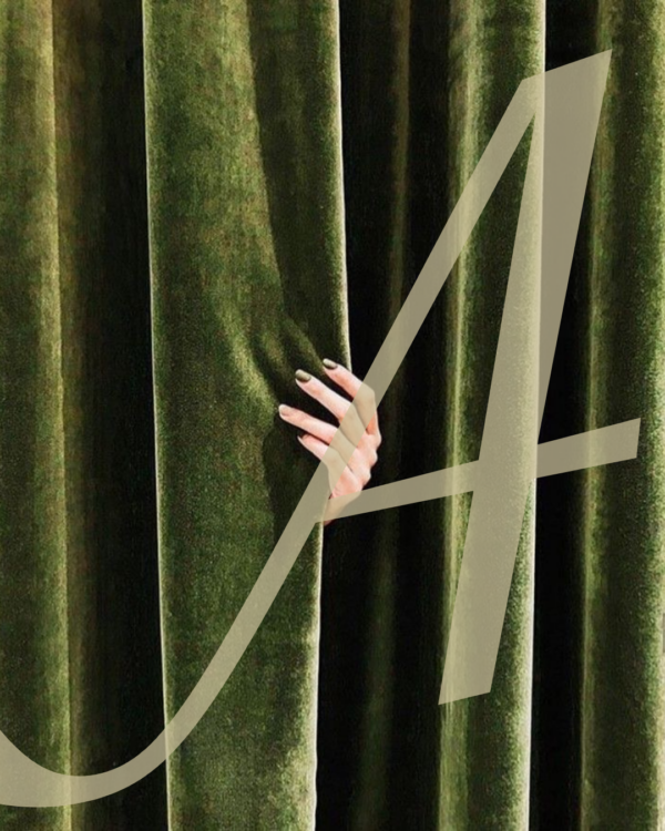 A mockup of the Analogue brand mark with a background of a green velvet curtain.