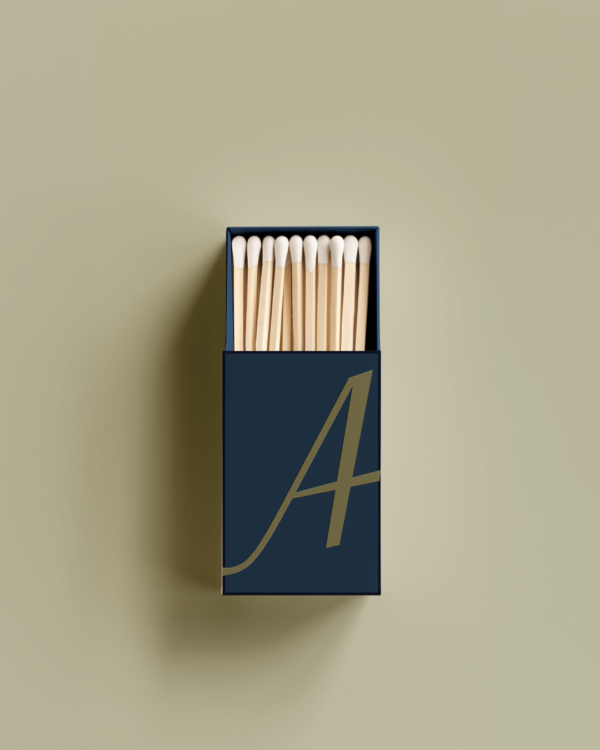 A mockup of the Analogue brand mark on a matchbook on a flat surface.